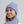 Tuque bleue pâle 100% mérinos sur jeune femme fabriquée au Canada / Light blue beanie on women model made of 100% merino wool by Volprivé.
