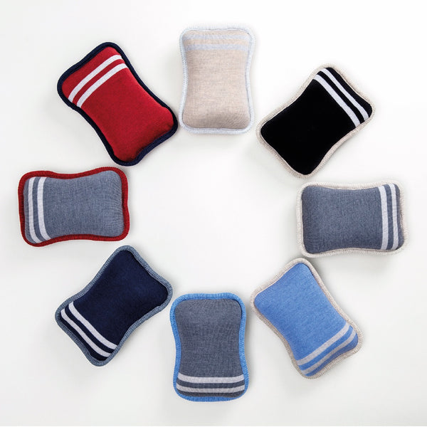 Assortiment d'oreillers compact de voyage en laine mérinos / Assortment of compact travel pillows in merino wool made by Volprivé.